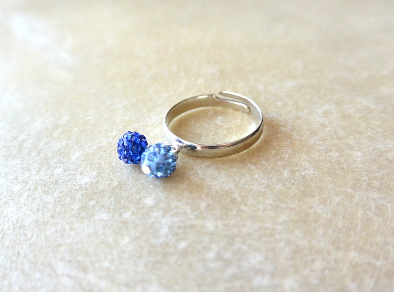 Silver adjustable Ring with 2 balls of blue strass. image 4