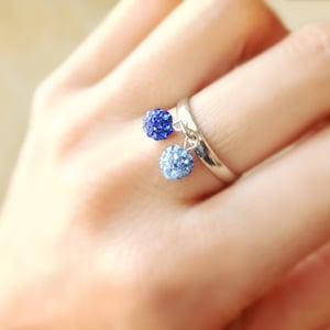 Silver adjustable Ring with 2 balls of blue strass. image 1