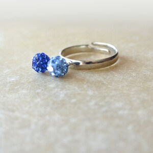 Silver adjustable Ring with 2 balls of blue strass. image 5