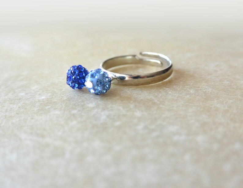 Silver adjustable Ring with 2 balls of blue strass. image 5