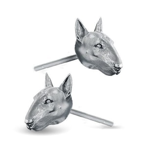 May include: A pair of silver earrings featuring a detailed 3D bull terrier head design.