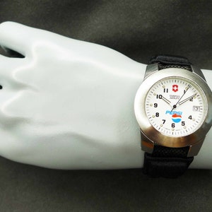 Swiss Army Pepsi Men&#39;s Swiss Made Stainless Steel Quartz Watch