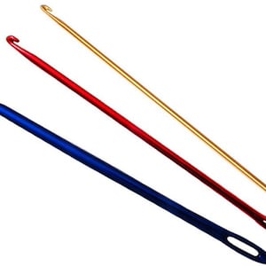 May include: Three crochet hooks in blue, red, and gold. The hooks are angled diagonally across the frame. The blue hook is on the left, the red in the middle, and the gold hook is on the right. Each hook has a hook on one end and an eyelet on the other.