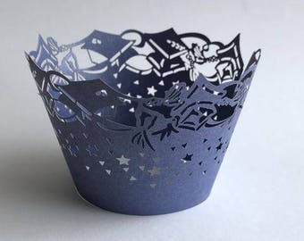 May include: Blue cupcake liners with a white star and graduation cap design.