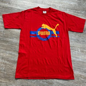 プーマtシャツ.80s il_fullxfull.5683084376_cp71.jpg