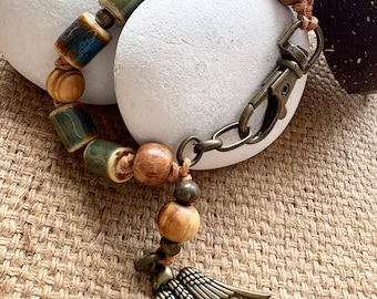 Ceramic Wood Bracelet, Rustic Earthy Boho Style, Hand knotted with Swallow Charm