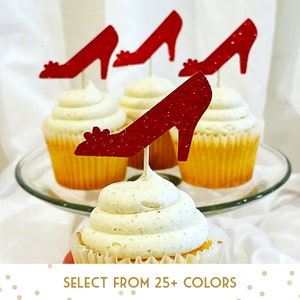 May include: Red glitter high heel shoe cupcake toppers on vanilla cupcakes with white frosting. Select from 25+ colors.