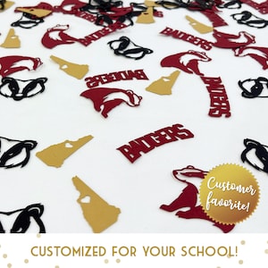 May include: Red and black confetti with a badger mascot, the word "Badgers", and a gold state outline. The confetti is labeled "Customer favorite!" and "CUSTOMIZED FOR YOUR SCHOOL!"