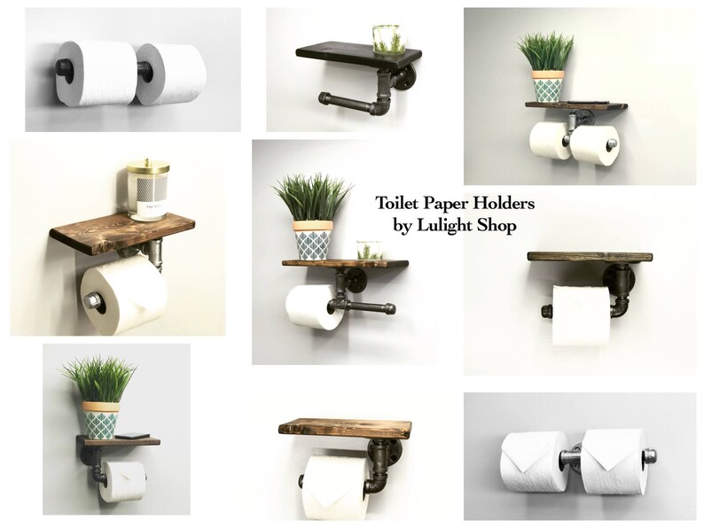 May include: A collection of rustic toilet paper holders. Each holder features a dark wooden shelf and industrial pipe fittings. Some include a single roll, while others hold two rolls. The text "Toilet Paper Holders by Lulight Shop" is visible.