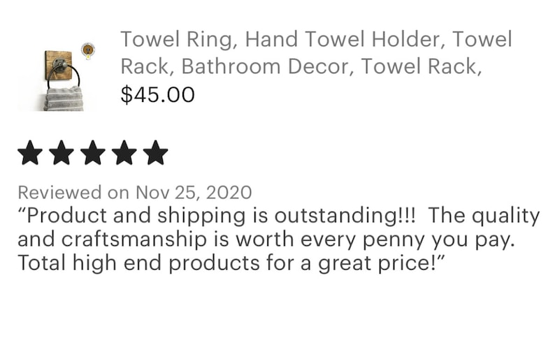 May include: A rustic wooden towel ring with a gray towel hanging on it. The ring is mounted on a wooden wall plaque. The product is described as a towel ring, hand towel holder, towel rack, bathroom decor, and towel rack. The price is $45.00.