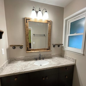 Wooden framed mirror with weathered finish farmhouse style