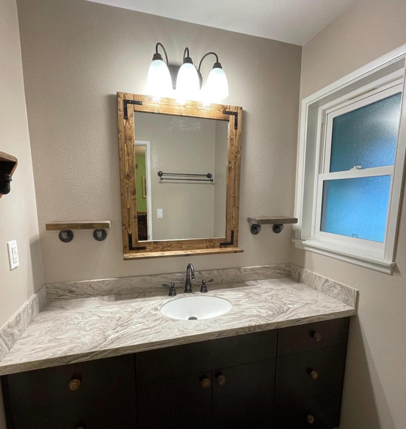 Wooden framed mirror with weathered finish farmhouse style