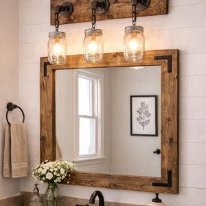 Rustic farmhouse bathroom vanity set with mirror and light fixture wall decor