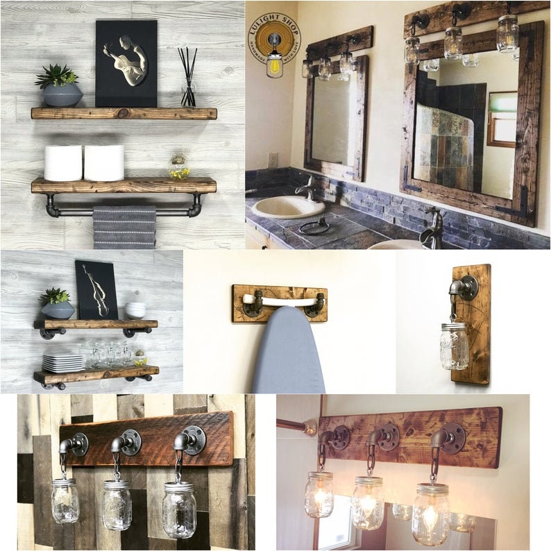 May include: A set of rustic bathroom fixtures made from reclaimed wood and metal pipe. The fixtures include a shelf, a towel rack, a coat rack, and a light fixture with mason jar globes. The fixtures are all in a dark brown color with a distressed finish.
