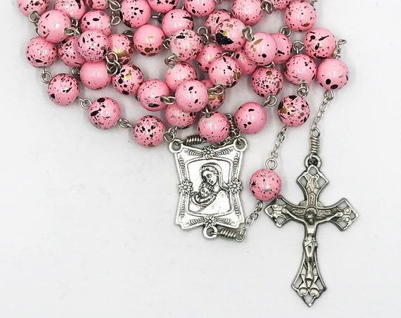 10mm pink splatter bead with fancy Madonna and Child center