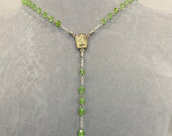 19.5" green crystal rosary with Our Lady of Medjugorje center