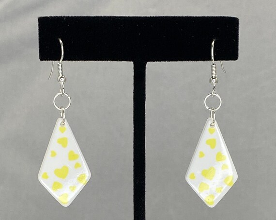 White and yellow acrylic drop earrings