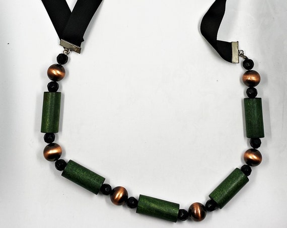50" green, copper, and black bead necklace with ribbon