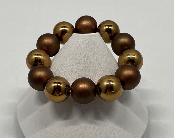 6.5" gold and brown bead stretch bracelet