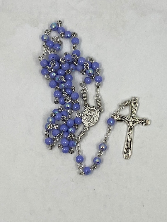 5mm blue shimmer bead rosary with Madonna/Sacred Heart center