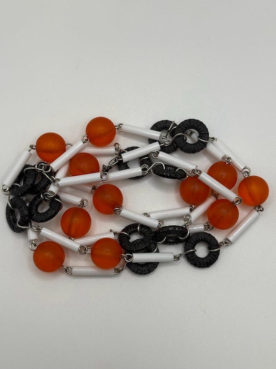 42" orange, black, and white bead necklace