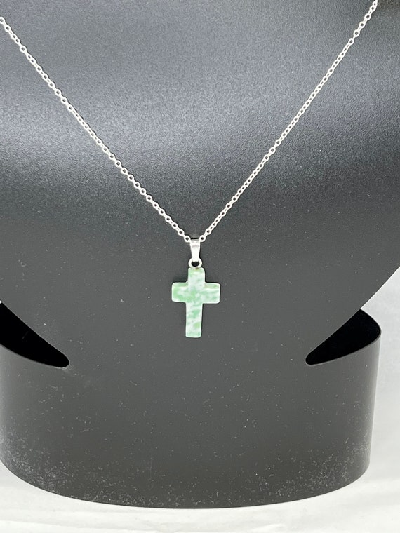 20" Ching Hai Jade cross pendant on silver chain with lobster clasp