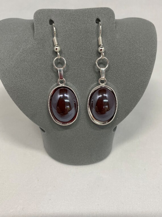 Purple oval drop earrings