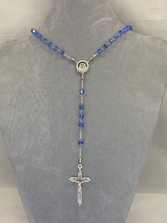 20" blue crystal bead rosary with Madonna center