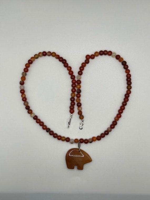 23.5" red agate bear or talon beaded necklace