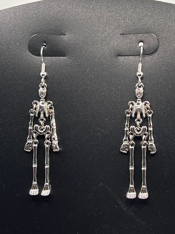 Dancing skeleton earrings