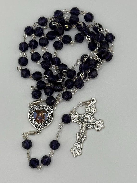 25" purple crystal bead rosary with Our Lady of the Rosary center and filigree crucifix
