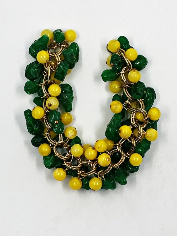 6" green and yellow on gold bracelet