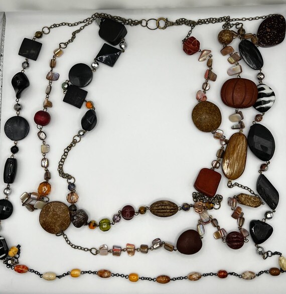 34" - 44" multi strand browns and blacks necklace
