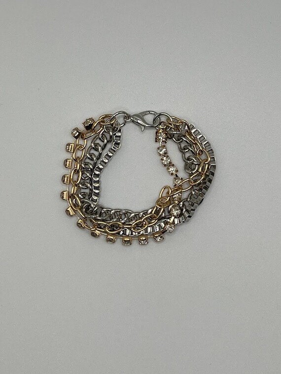 6.5" multi strand gold and silver bracelet