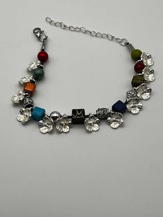 7" multi bead and silver flower bracelet