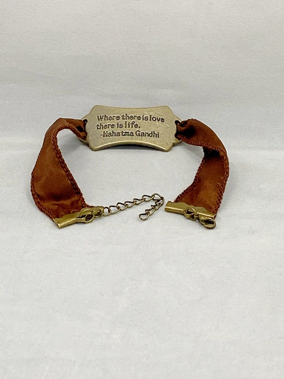 Ghandi quote bracelet on brown or black ribbon