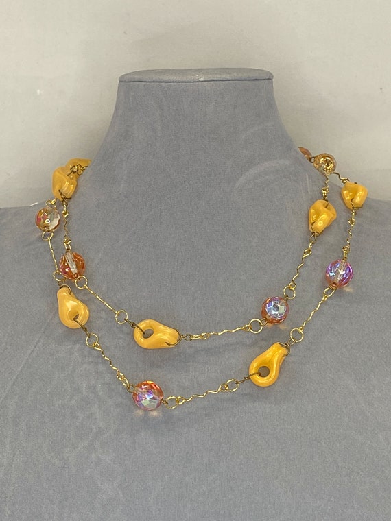 38" continuous loop peach and orange crystal necklace