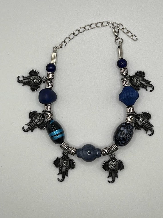 7" blue bead and elephant charm bracelet