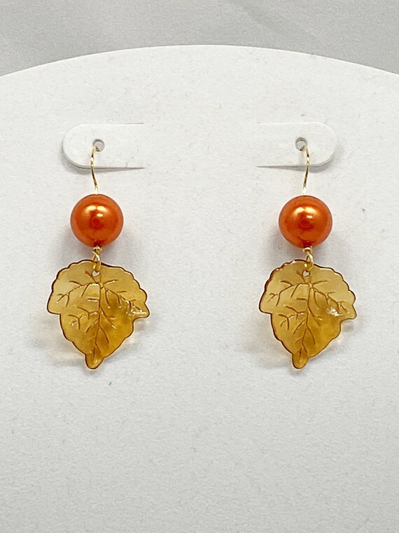 2" orange pearl and brown leaf earrings