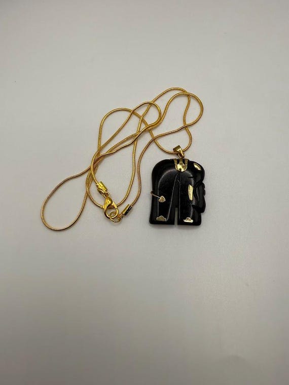 22" carved elephant pendant necklace