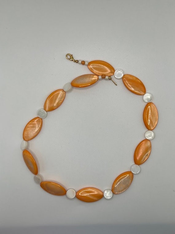 19" orange mother of pearl oval necklace