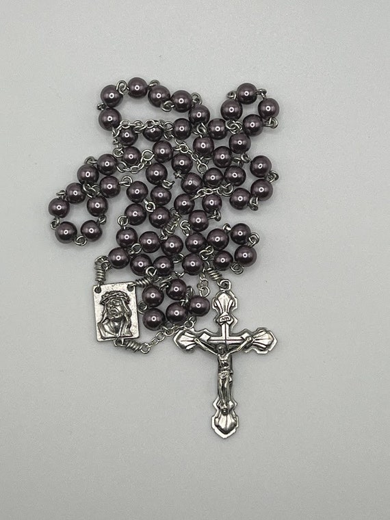 19" purple pearl bead rosary with Crucified Christ center and shell crucifix