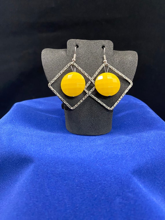 Yellow and gunmetal earrings