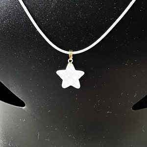 18&quot; white cat eye pendant on grey cord