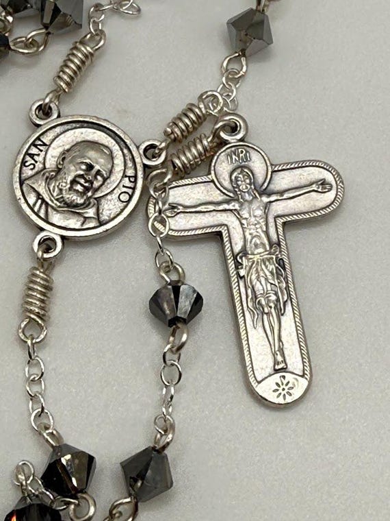 27" metallic silver crystal bead 7 decade crown rosary with Padre Pio relic center and Marian crucifix
