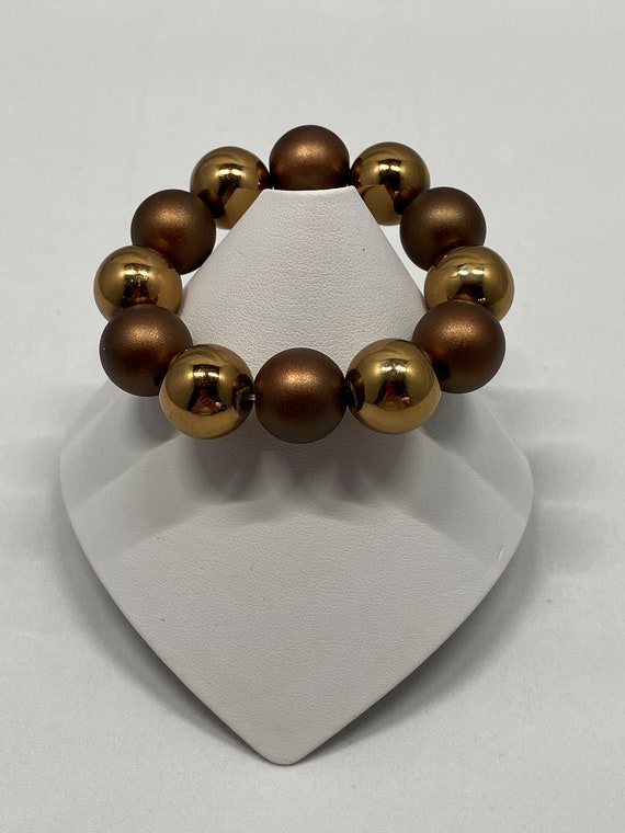 6.5" gold and brown bead stretch bracelet