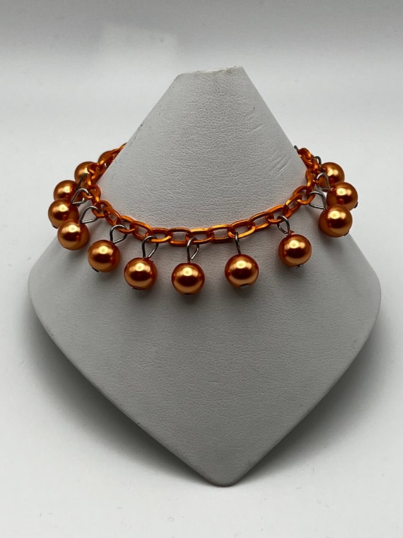 7" orange pearl bracelet