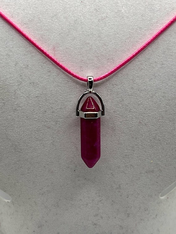18" dark pink glass pendant on pink cord with silver lobster clasp and 2" chain extender