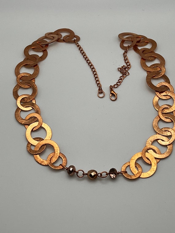 23.5" bright copper rings necklace
