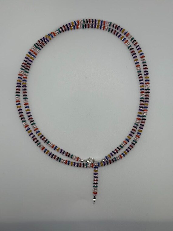 35" pink glass beads and rubber ring necklace